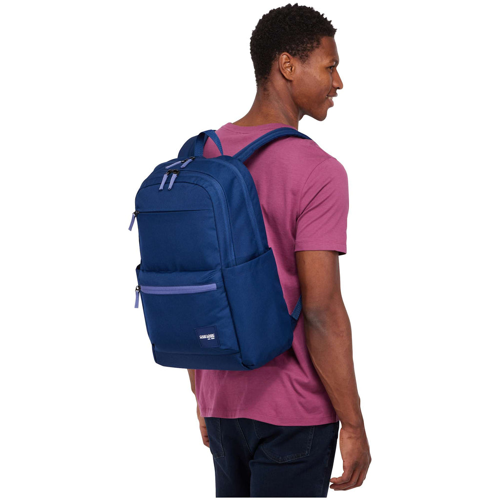 Case Logic Uplink Recycled Laptop Backpack, 26L Embroidery - Navy Blue - Left Angle Lifestyle