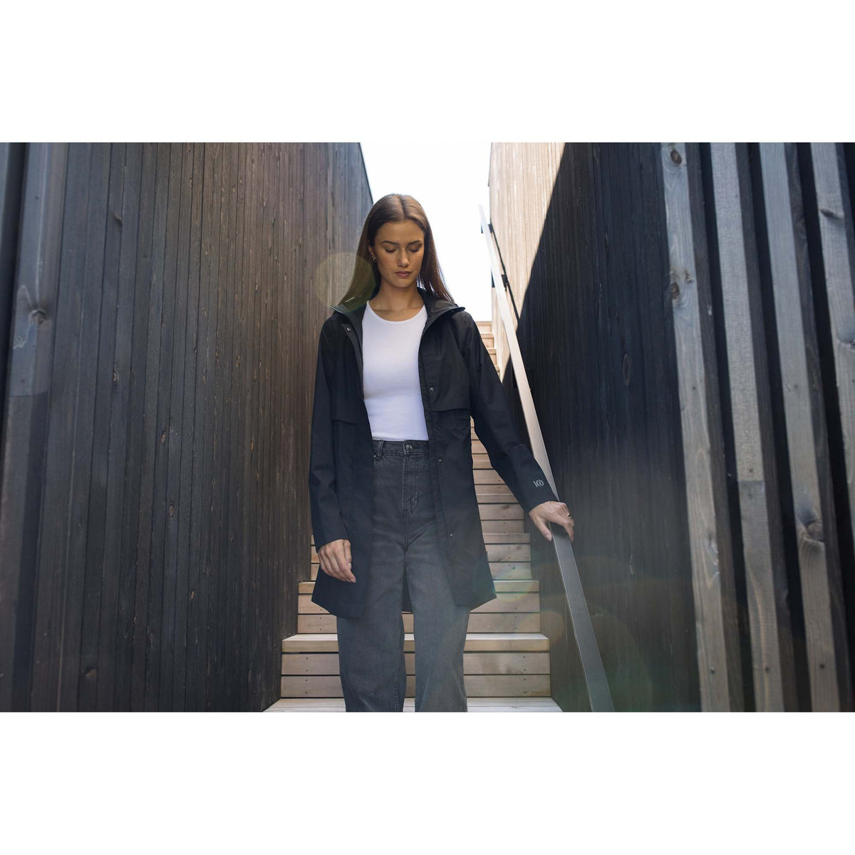 tentree Nimbus Long Waterproof Rain Jacket for Women Transfer - ten Meteorite Black - Front On Model